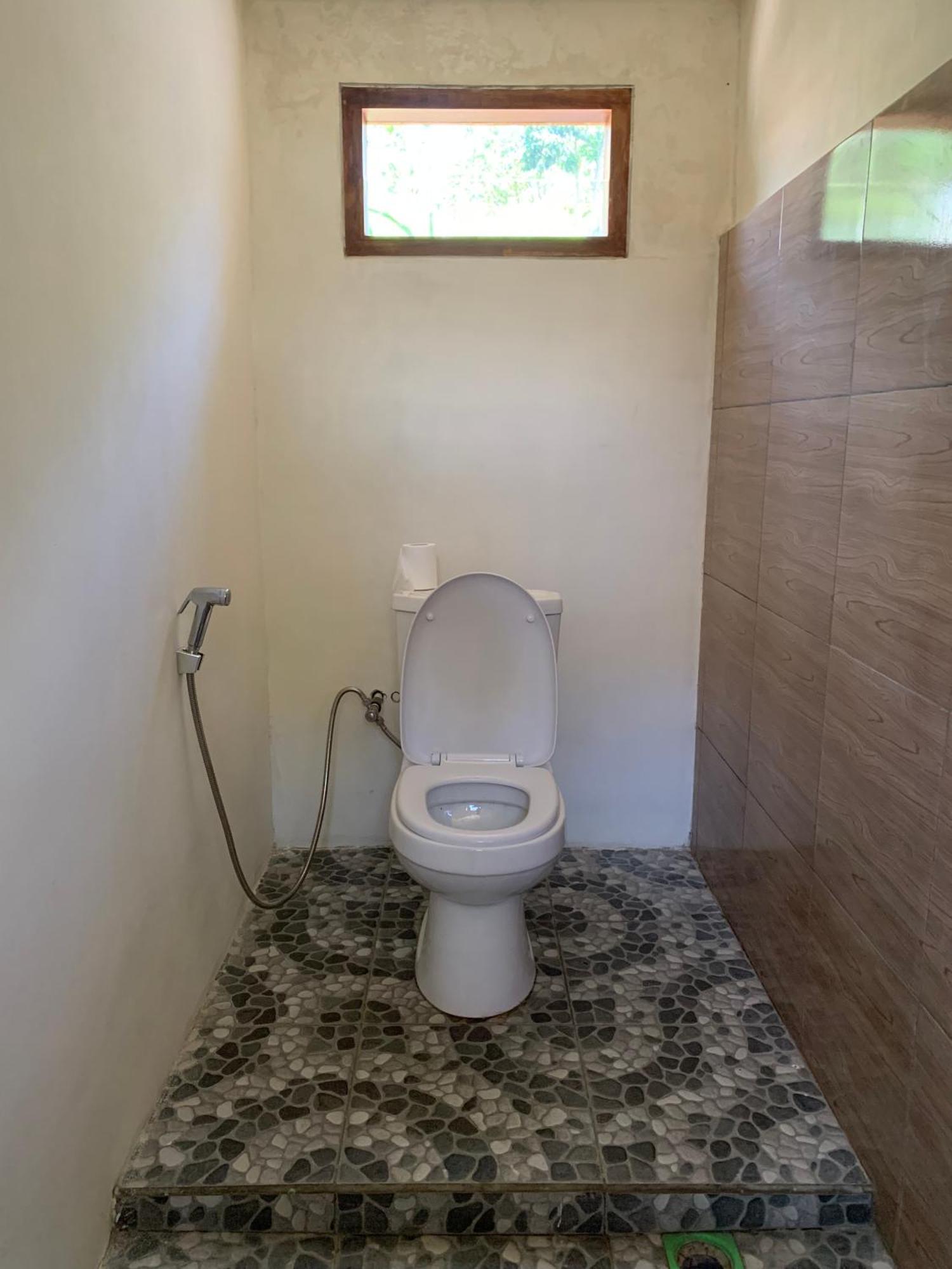 Avocado Homestay Тетебату Екстериор снимка
